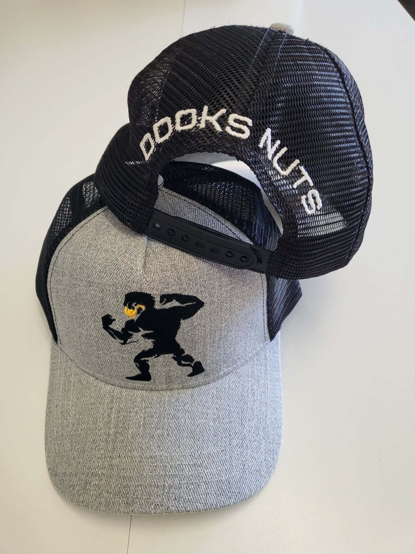 Dooks nuts truckers style embroidered grey cap.